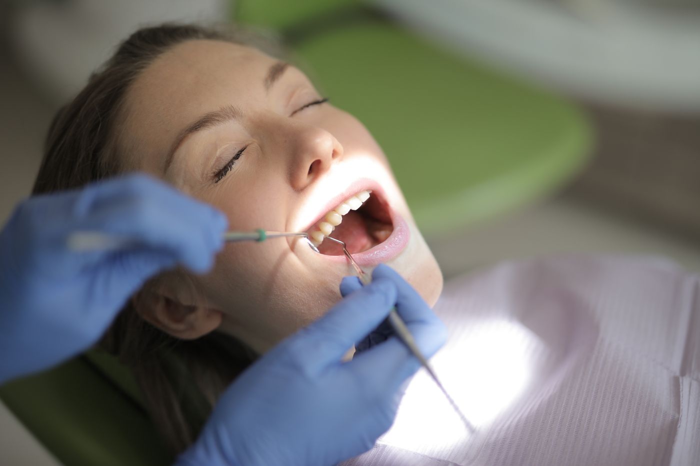 Patient receiving gentle dental care